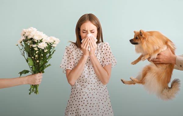 Image having an unkown allergic reaction to flowers or dog